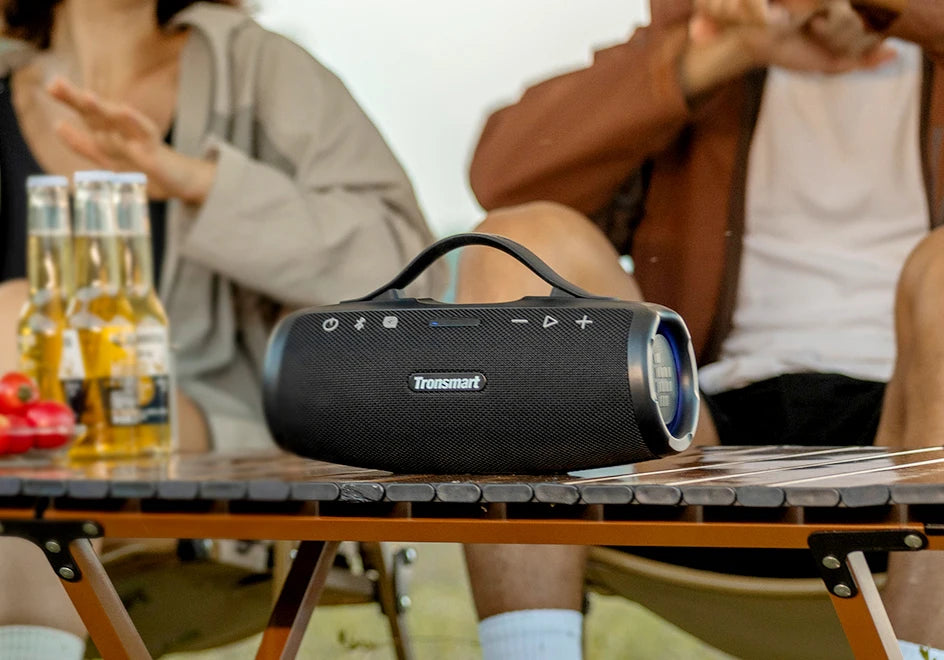 Caixa de Som Bluetooth Tronsmart Mirtune S100 – 50W, À Prova d’Água IPX7, Controle por App, Powerbank Integrado e Alça Retrátil